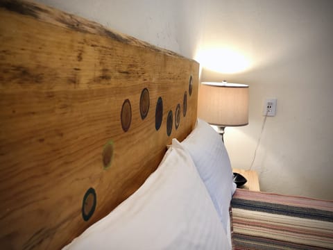 Family Suite, Private Bathroom (Queen Bed and 3 Twin Beds) | Iron/ironing board, free WiFi, bed sheets