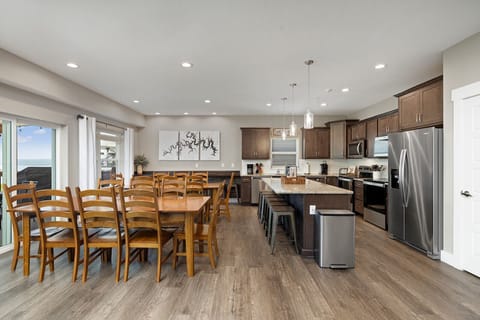 Two Dining Table, island, and bar seating