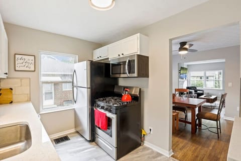 Kitchen (refrigerator, oven, microwave, and sink)