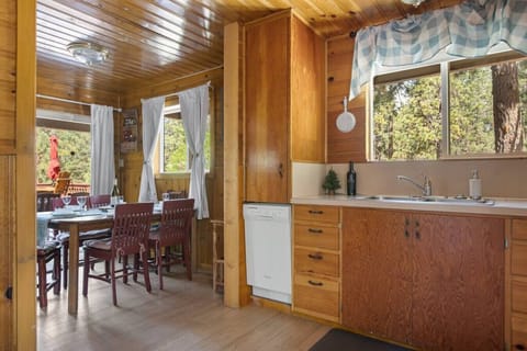 Kitchen and seating for 6 in dining room.