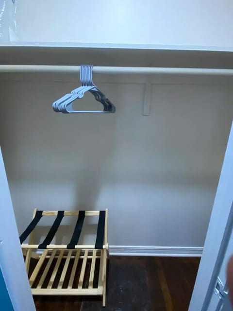 Each bedroom is equipped with luggage racks and hangers