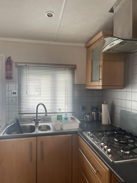 Cabin | Private kitchen | Fridge, microwave, oven, stovetop