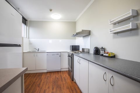 Family Apartment | Private kitchen | Mini-fridge, coffee/tea maker, electric kettle