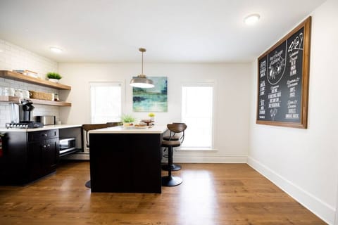 Following the hallway further to the right, you will find the full kitchen that has everything you need to prepare a meal.