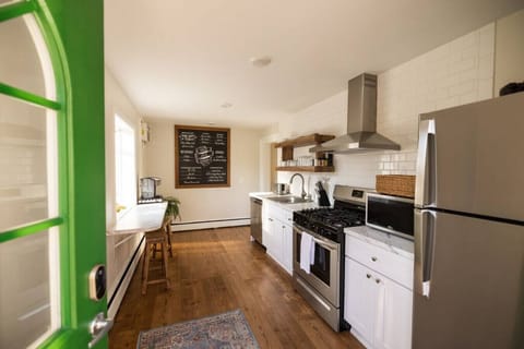 Upon entering you will find a lovely, full kitchen with breakfast nook overlooking the backyard.