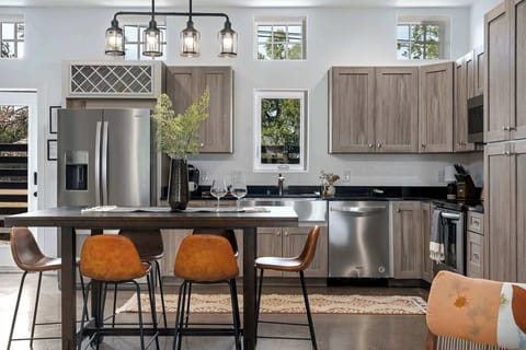 Views from living room to kitchen.