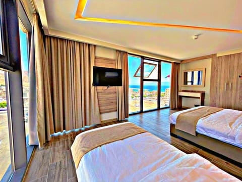 Basic Double or Twin Room, 1 Bedroom, Non Smoking, Sea View | Free WiFi, bed sheets