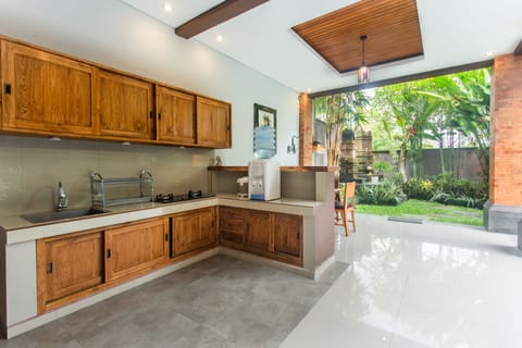 Villa | Private kitchen | Full-size fridge, stovetop, dishwasher, electric kettle