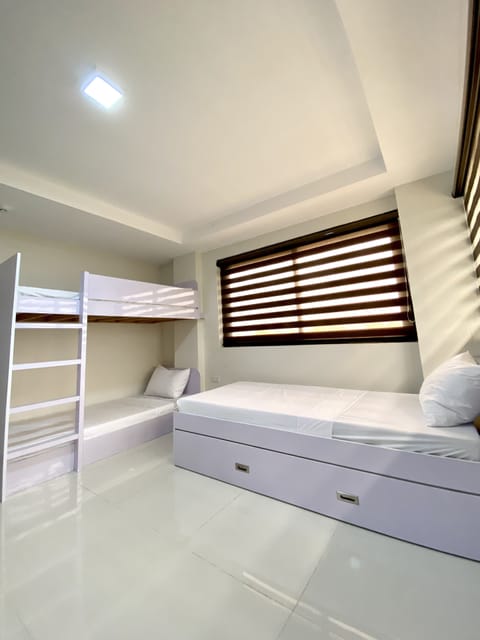 Hostel Room | Premium bedding, down comforters, individually decorated