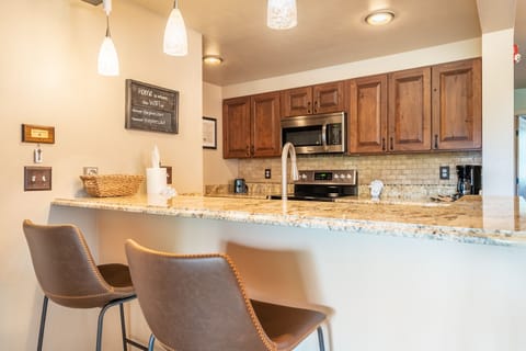Breakfast bar with seating for two.