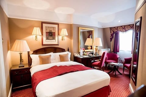 Deluxe Room | Premium bedding, in-room safe, desk, blackout drapes