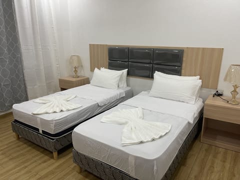 Basic Single Room | Down comforters, free WiFi, bed sheets