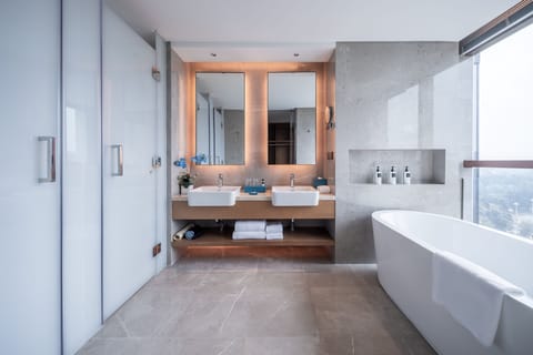 Deluxe Suite, 2 Bedrooms | Bathroom | Designer toiletries, hair dryer, bathrobes, slippers