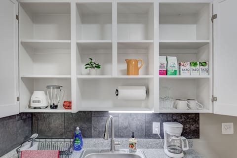 Coffee and tea, wine glasses and coffee mugs, blender