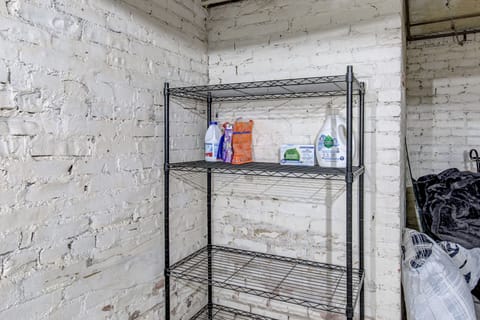 Laundry detergent and dryer sheets provided. Lots of storage for other items.