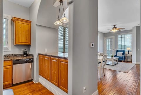 The kitchen is just around the corner from everything.