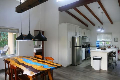 Kitchen, Dining table and bedroom 2 (Bedroom 2- Only opens when booking for 3 persons and up)