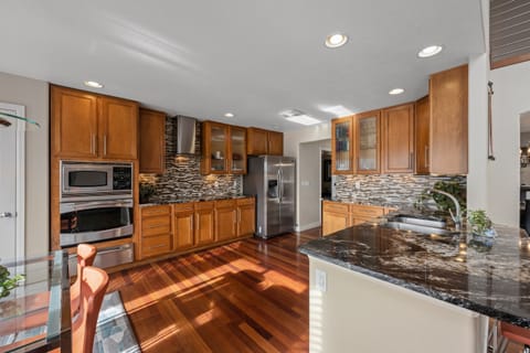 Microwave, oven and warming drawer. Full stove-top, refrigerator and dishwasher.