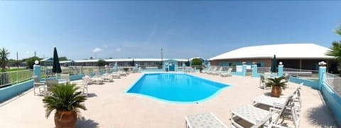 Outdoor pool, open 9 AM to 11:00 PM, sun loungers