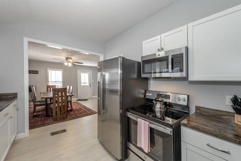 The fully equipped kitchen comes with stainless steel appliances and everything you could need to make delicious meals