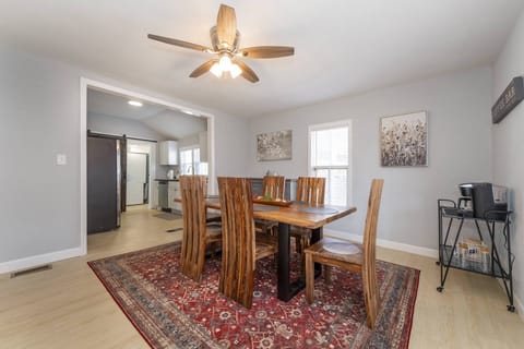 The dining room has a table for 6 and a coffee station with a dual carafe/k-cup coffee pot