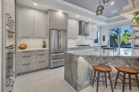 Decked out with dishes for serving twelve, serving dishes, glasses, utensils.