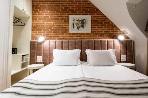 Suite | Premium bedding, down comforters, memory foam beds, free minibar