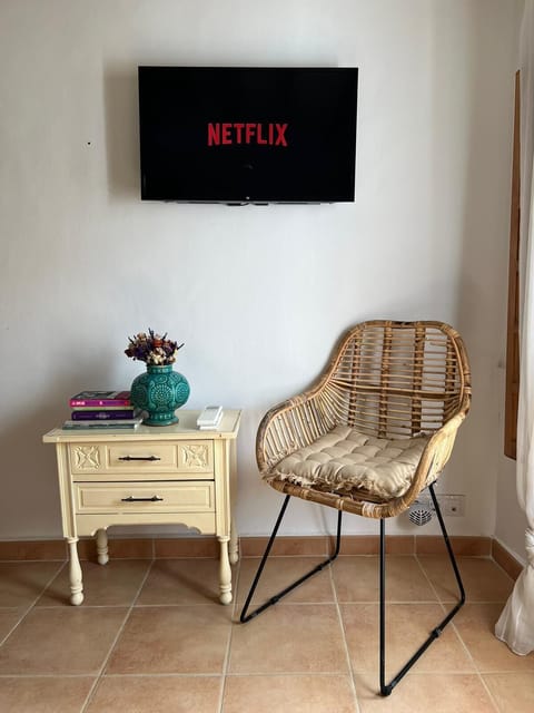 Kitchen with living room and TV