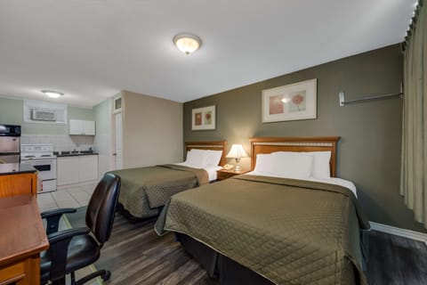 Suite, 2 Double Beds, Kitchenette | Desk, free WiFi, bed sheets, alarm clocks