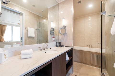 Luxury Suite, 1 King Bed, Jetted tub | Bathroom | Designer toiletries, hair dryer, towels, soap