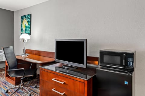 Deluxe Room, 2 Queen Beds, Non Smoking | In-room safe, desk, laptop workspace, blackout drapes