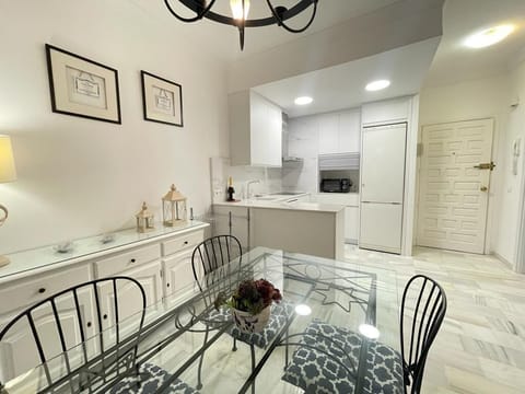 Beautiful dining area, equipped with table and chairs for you to share a delicious home cooked meal. (3)