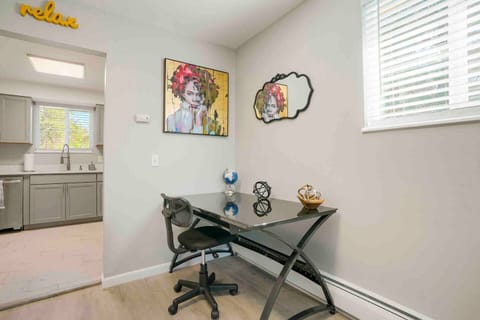 Office area for working or personal needs. Desk is oversized and suitable for remote workers or for planning out your vacation days.