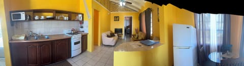 2 Bedroom Apartment | Living area | Flat-screen TV