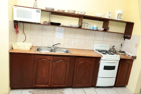 2 Bedroom Apartment | Private kitchen | Full-size fridge, microwave, stovetop, coffee/tea maker