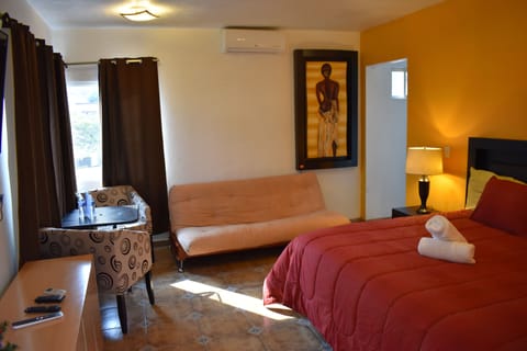 Traditional Suite, 1 King Bed | Iron/ironing board, free WiFi, bed sheets