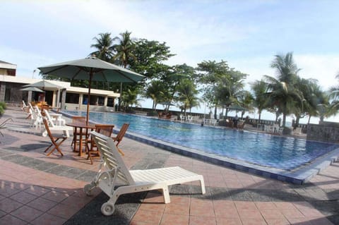 Outdoor pool, pool umbrellas, sun loungers