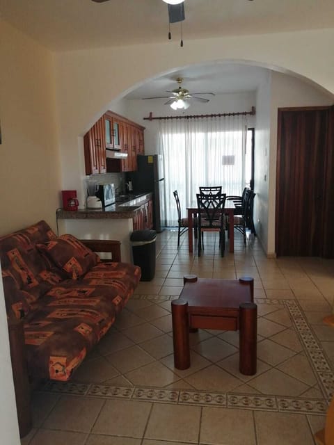 Family Apartment, 2 Bedrooms, Balcony, Beach View | Living area | 38-inch Smart TV with cable channels, Netflix, streaming services