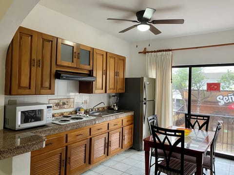 Family Apartment, 2 Bedrooms, Balcony, Beach View | Private kitchen | Full-size fridge, microwave, oven, blender