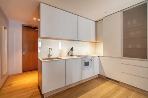 Comfort Apartment | Private kitchen | Full-size fridge, stovetop, dishwasher, espresso maker