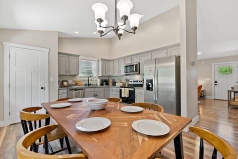 Large dining table in the kitchen with room seating for 6
