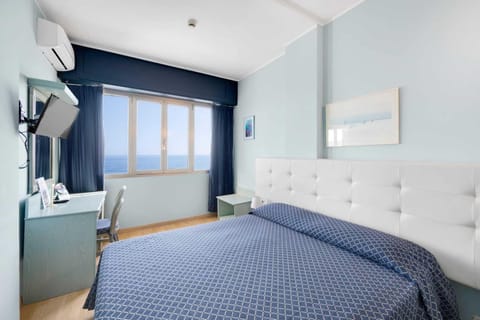 Classic Room, Sea View, Sea Facing | Minibar, in-room safe, desk, laptop workspace