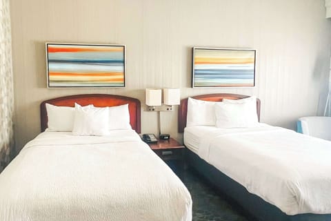 Premium bedding, down comforters, desk, laptop workspace