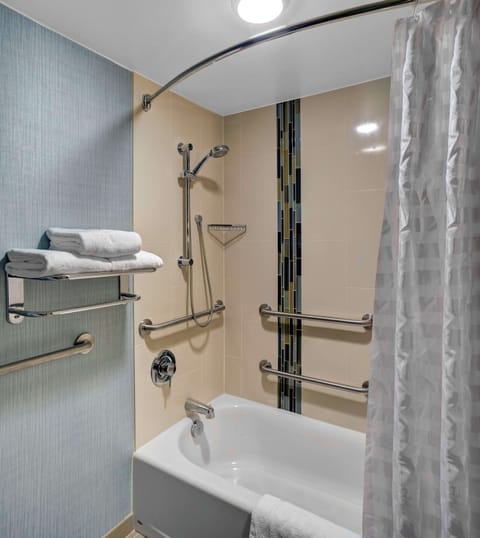 Room, 1 King Bed (Accessible, Bathtub) | Bathroom | Designer toiletries, hair dryer, towels, soap