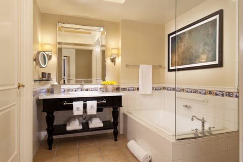 Separate tub and shower, deep soaking tub, designer toiletries