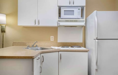 Studio, 1 Queen Bed, Non Smoking | Private kitchen | Full-size fridge, microwave, stovetop