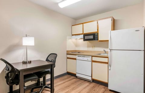 Deluxe Studio, 1 Queen Bed with Sofa bed, Non Smoking | Private kitchen | Full-size fridge, microwave, stovetop, dishwasher