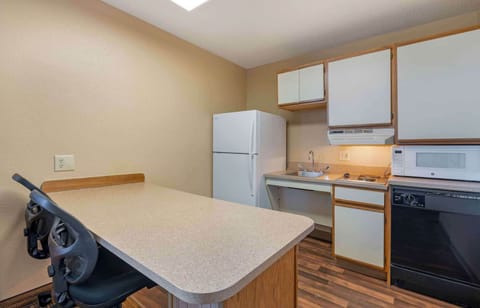 Deluxe Studio, Multiple Beds, Non Smoking | Private kitchen | Full-size fridge, microwave, stovetop, dishwasher