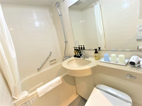 Combined shower/tub, hair dryer, bathrobes, slippers