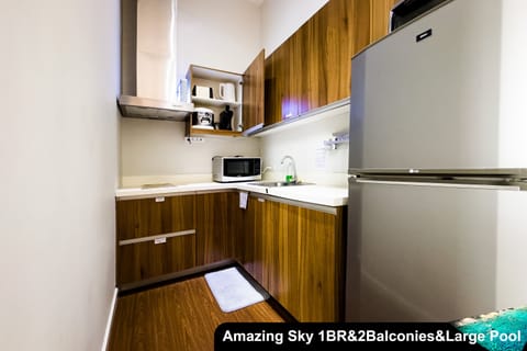 Business Apartment, 1 Bedroom, Balcony, City View | Private kitchen | Fridge, microwave, stovetop, espresso maker